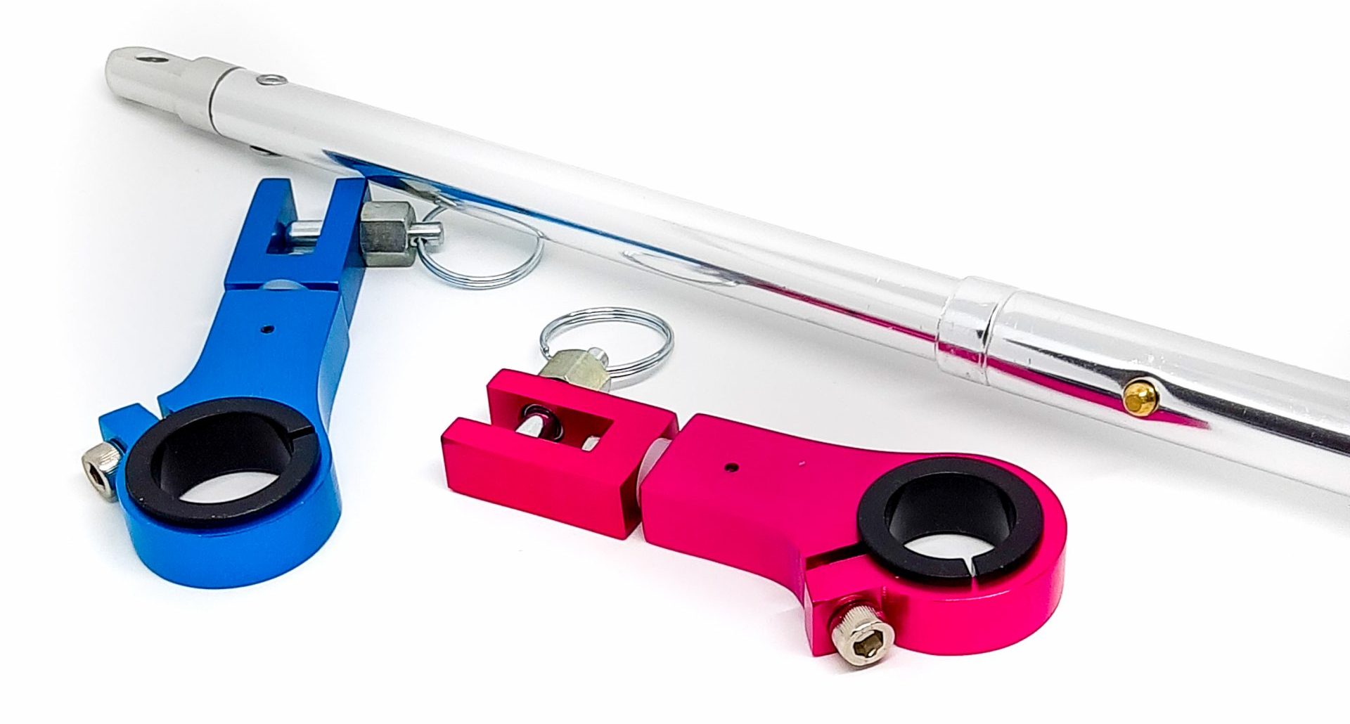 Pink and blue PushmeHome clamp, accessories and handle